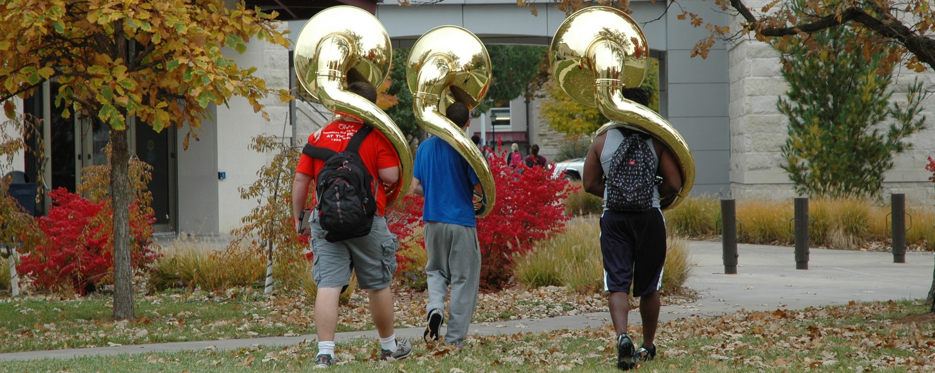 Students Walking with Tubas